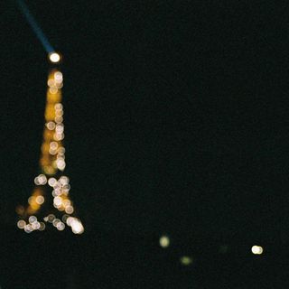 The Eiffel Tower sparkling at night