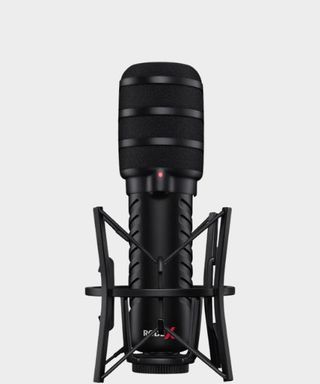 The RODE X XDM-100 microphone on a grey background