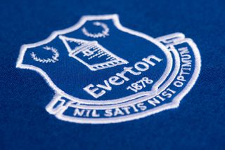 A close-up shot of the Everton club crest