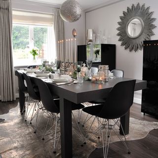 dining room with dining table chair and moroccan style pendant lights