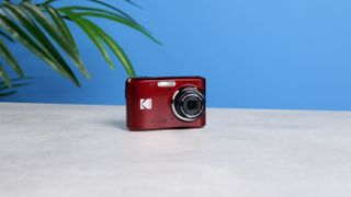 A cherry red Kodak PIXPRO FZ45 compact digital camera