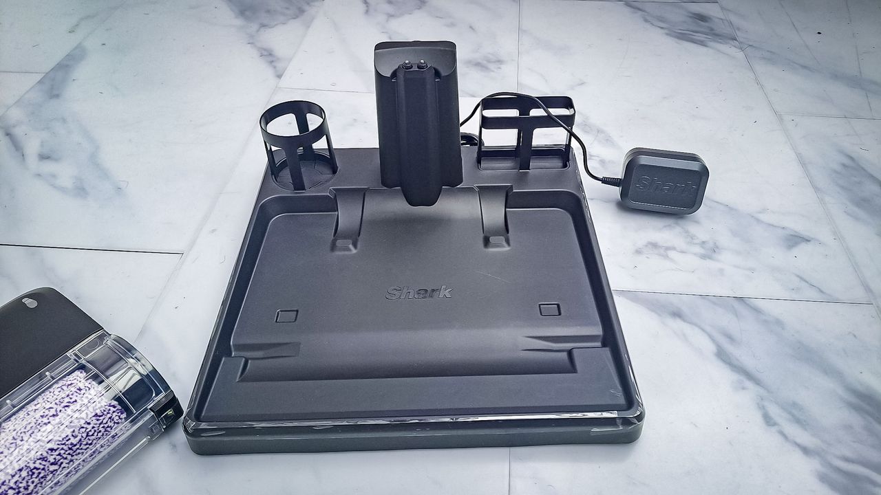Shark HydroVac MessMaster cleaner on white floor tiles