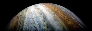 The colorful cloud belts of Jupiter's southern hemisphere dominate this stunning photo from NASA's Juno spacecraft in orbit around the gas giant released on Jan. 12, 2018. Juno captured the image on Dec. 16, 2017. It was processed by citizen scientist Kev