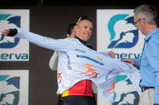 Philippe Gilbert puts o the leader's jersey after stage 2 ay Three Days of De Panne.
