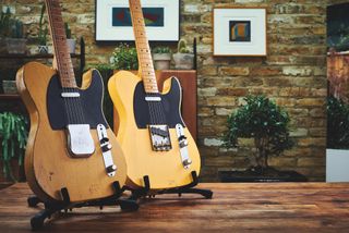 A 1950 Fender Broadcaster (left) and a Fender Custom Shop Nocaster, photographed at the Seven Decades V&A exhibition in London on November 6, 2018