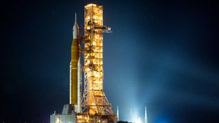 In this handout photo provided by NASA, NASA's Space Launch System (SLS) rocket with the Orion spacecraft aboard is seen atop the mobile launcher as it rolls out of the Vehicle Assembly Building to Launch Pad 39B at NASAs Kennedy Space Center on November 3, 2022 in Cape Canaveral, Florida. 