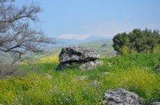 This heap of stones and boulders is an ancient construction known as a dolmen.