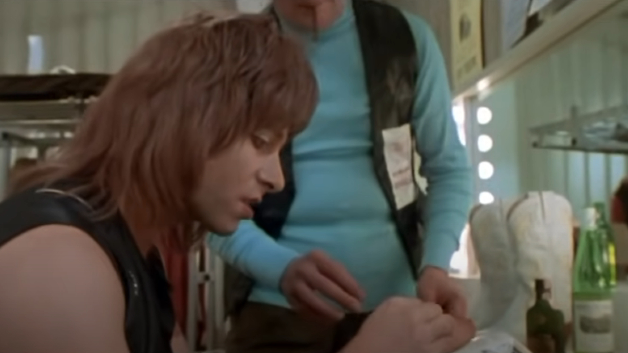 Christopher Guest holding bread in This Is Spinal Tap