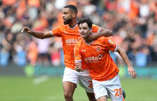 Blackpool's Charlie Patino celebrates scoring his side's second goal with team-mate CJ Hamilton during the Sky Bet Championship between Blackpool and Preston North End at Bloomfield Road on October 22, 2022 in Blackpool, United Kingdom.