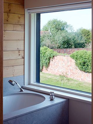 Bath with a view out into the garden