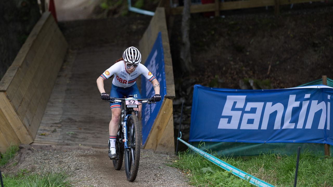 Isla Short riding in the Women's XCO race at Glentress