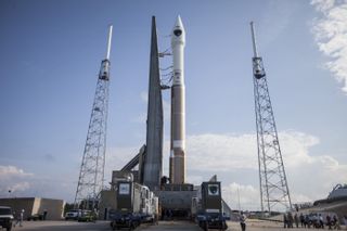 A United Launch Alliance Atlas 5 rocket rolls out to the launch pad carrying the U.S. Air Force's GPS 2F-7 navigation satellite. The mission will launch Aug. 1, 2014 from Cape Canaveral Air Force Station in Florida.