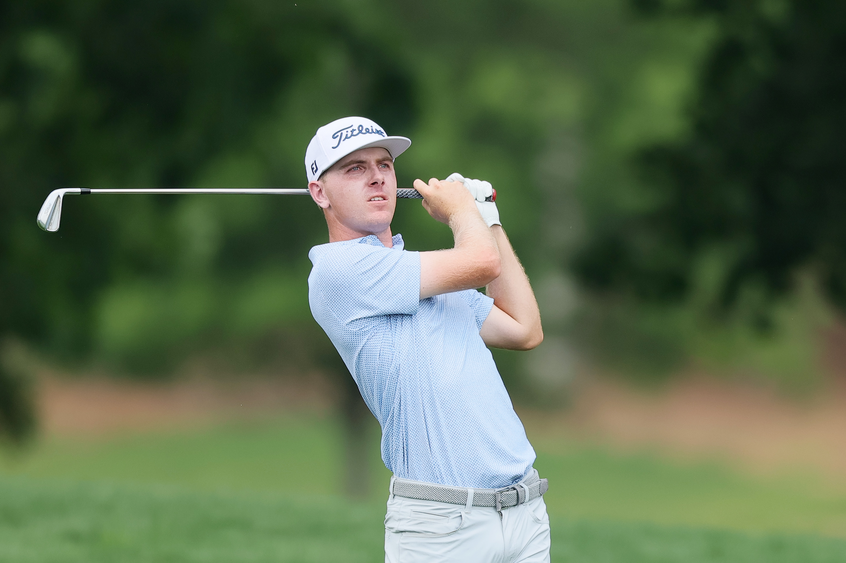Ryan Gerard hits an iron shot