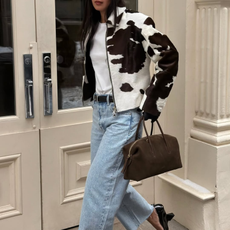 Cow print jacket and light wash jeans