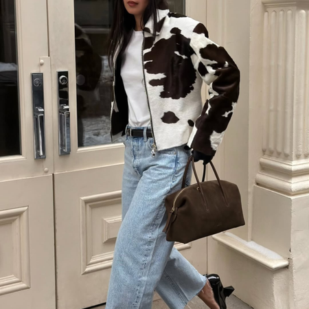 Cow print jacket and light wash jeans