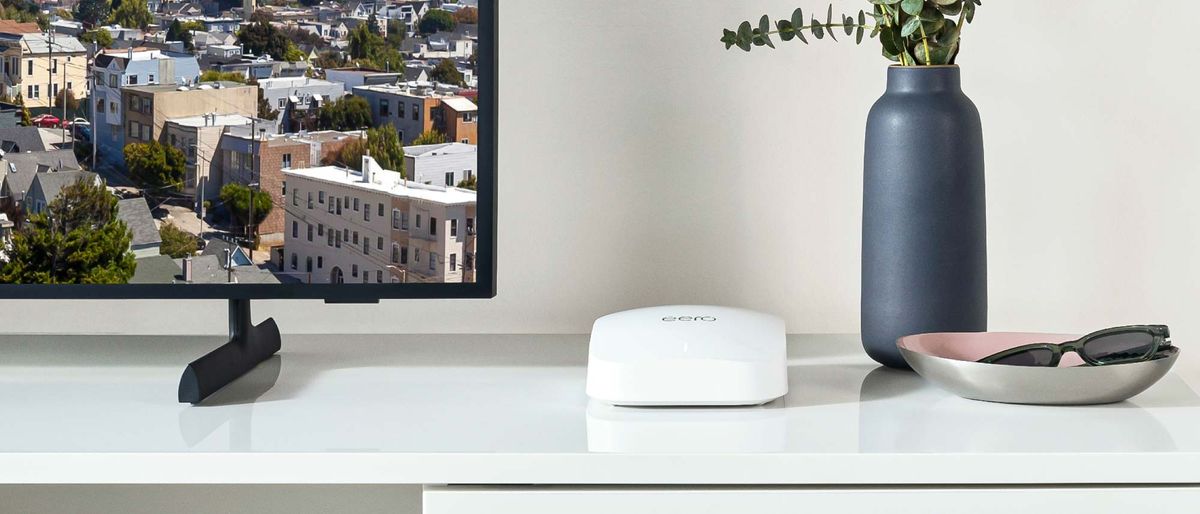 Eero Pro 6e on shelf in living room