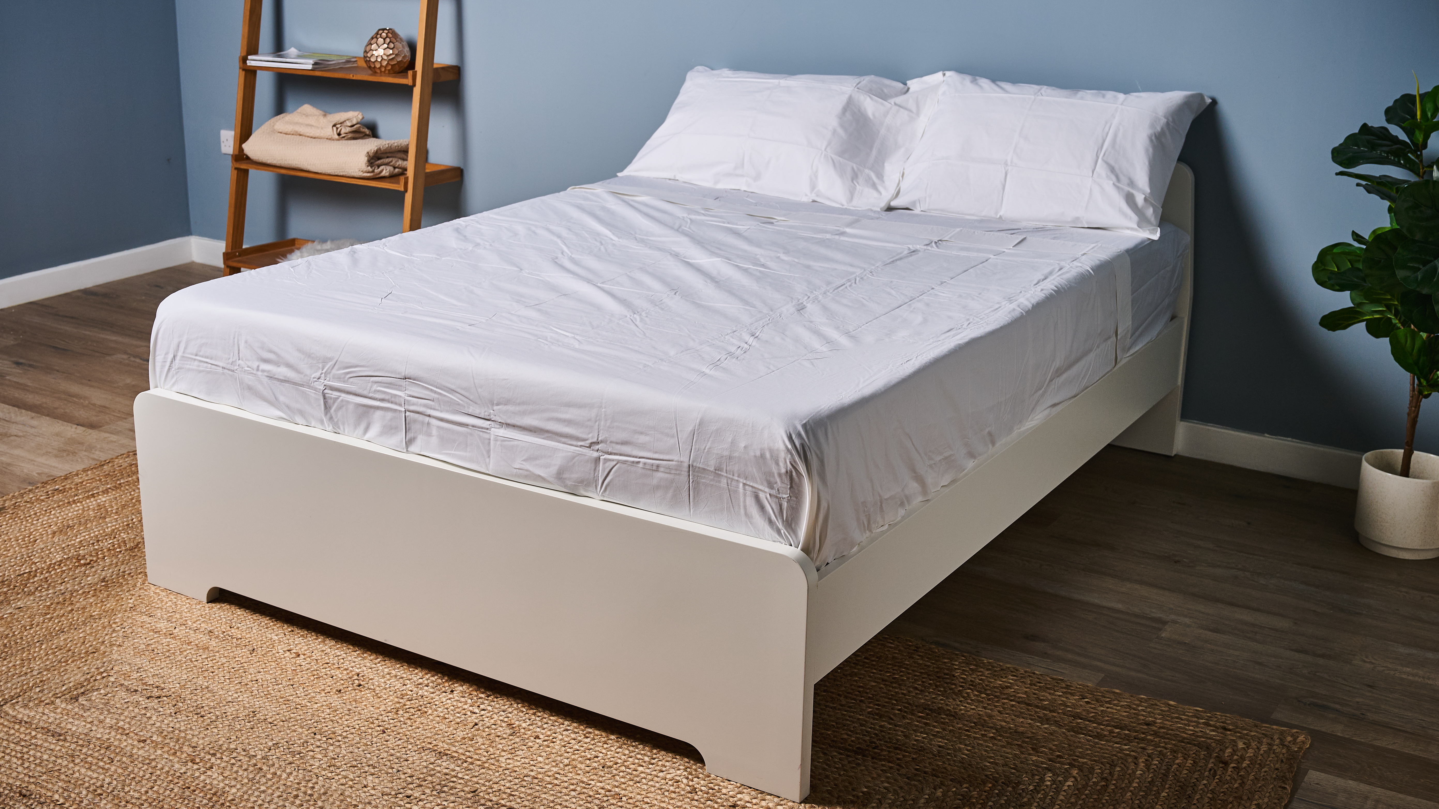 Coop Percale sheet set on the bed in TG sleep studio