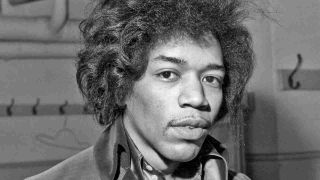 Jimi Hendrix posing for a photograph in 1966