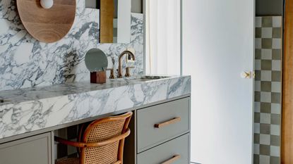 a checkerboard and marble bathroom