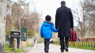 Father and son walking