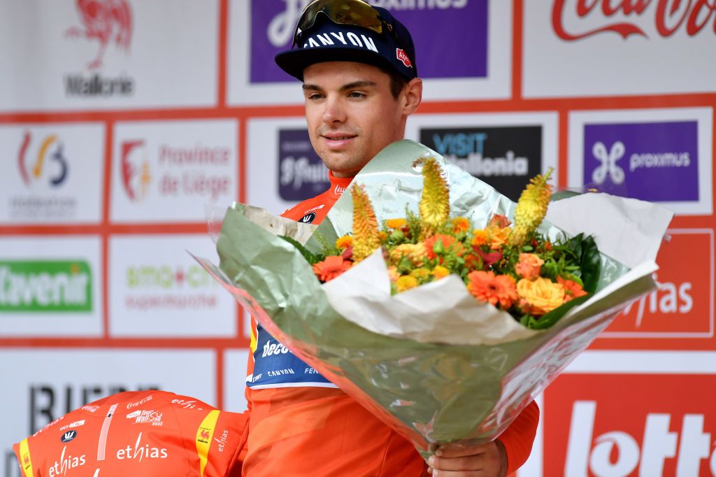 ROCHEFORT BELGIUM JULY 25 Robert Stannard of Australia and Team AlpecinDeceuninck celebrates winning the Orange Leader Jersey on the podium ceremony after the 43rd Ethias Tour de Wallonie 2022 Stage 3 a 1956km stage from Vis to Rochefort ethiastourdewallonie22 on July 25 2022 in Rochefort Belgium Photo by Luc ClaessenGetty Images