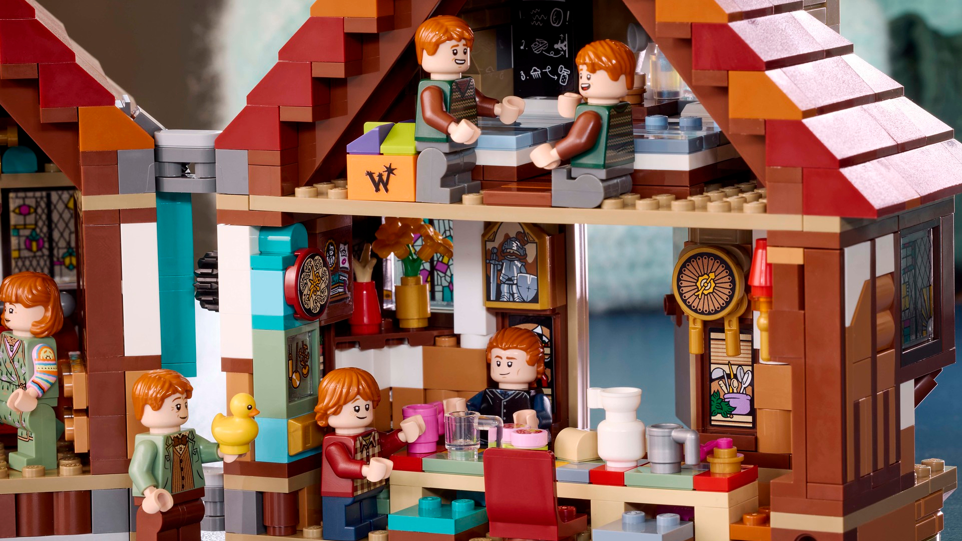 Interiors of Lego The Burrow, with minifigures posing inside