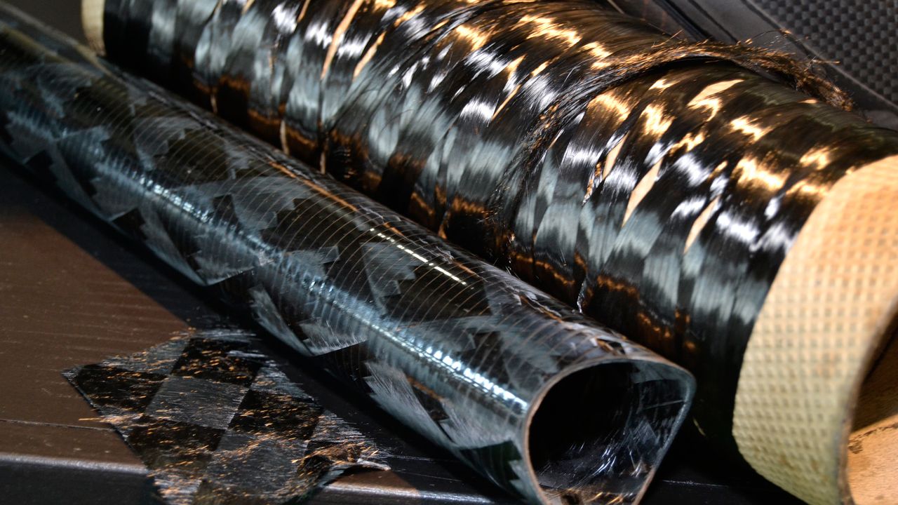 Some of the raw material that goes into a frame. Festka sources its raw carbon in this form from a huge supplier called Compotech. Festka then makes its own tubes and frames. This process allows Festka to use a much higher proportion of ultra high modulus carbon fibre, which is brittle in the wrong direction and unable to be bent around tight corners. Manufacturing its own tubes allows Festka to get around that. The black and white Festka One LT features over 700 metres of continuous carbon fibre
