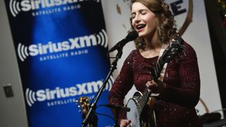 Singer/Songwriter Caroline Jones performs during "Let it Snow" SiriusXM Acoustic Christmas With Jewel And Shawn Mullins at SiriusXM Music City Theatre on December 14, 2015 in Nashville, Tennessee. 