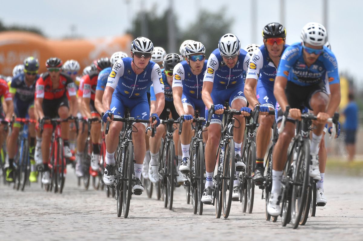 Quick-Step Floors all over the front of the peloton