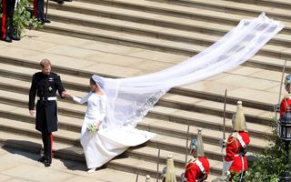 Prince Harry, Duke of Sussex and The Duchess of Sussex leave St George's Chapel, Windsor Castle after their wedding ceremony on May 19, 2018 in Windsor, England