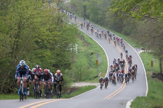 A group gets a small gap over the peloton through a fast section of rolling hills.