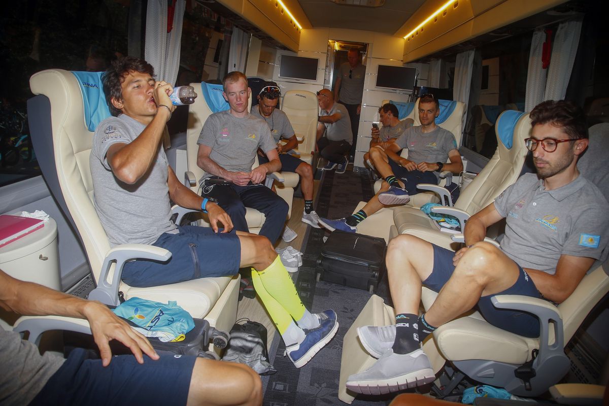 Astana await the stage on their bus