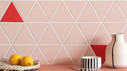 Pink triangular tiles in a kitchen