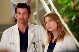 Derek Shepherd and Meredith Grey in their white doctors coats in 'Grey's Anatomy.'