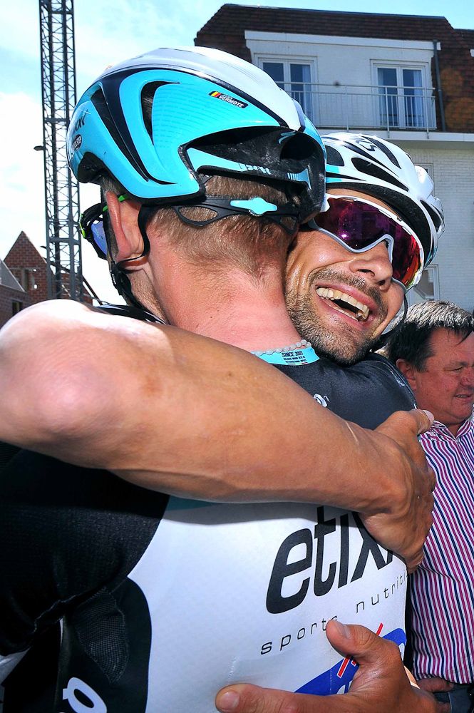 A happy Tom Boonen collects a hug after his stage 1 win at the Belgium Tour.