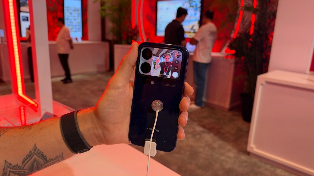 The Xiaomi 18 Pro being held in the hand