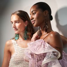 two models backstage posing at the zimmerman spring 2025 show