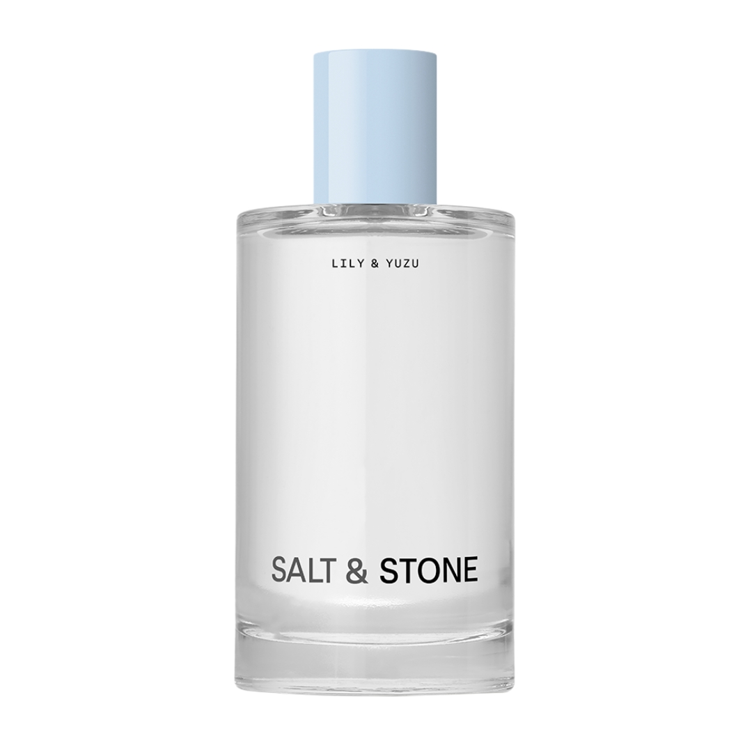 Glass bottle of Salt &amp;amp; Stone Lily &amp;amp; Yuzu Body Mist with light blue lid