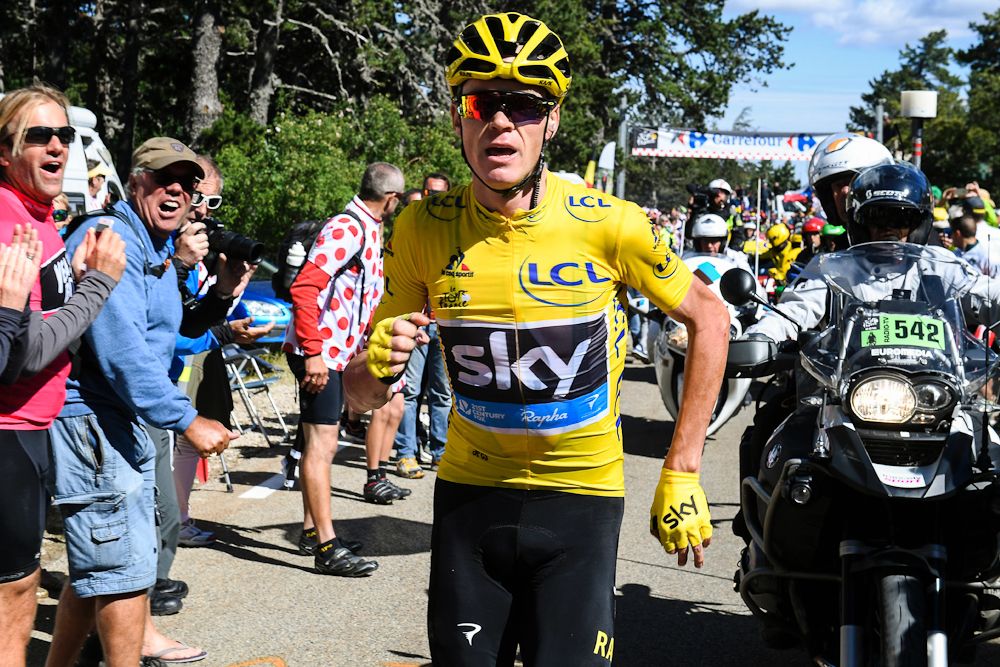 Chris Froome runs for the line during stage 12 of the Tour de France