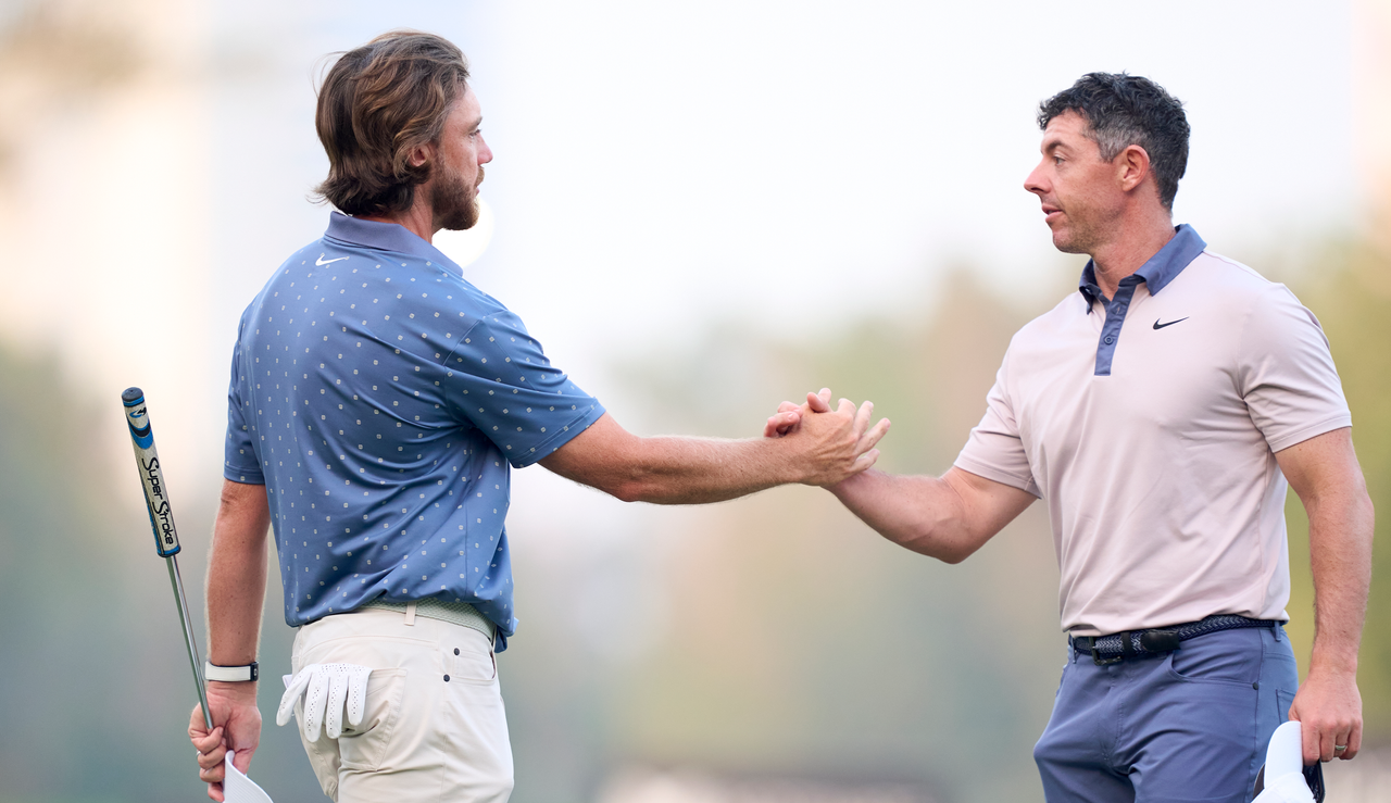Tommy Fleetwood and Rory McIlroy shake hands