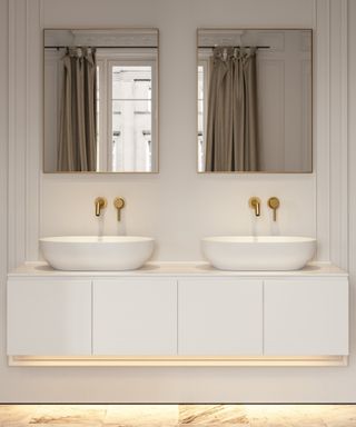 white wall mounted vanity unit with two sinks and mirrors above