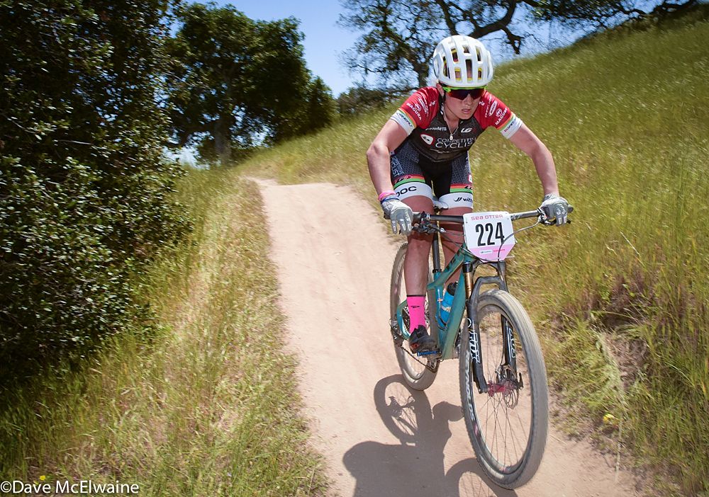 Ellen Noble (Competitive Cyclist) descending at the end of lap one
