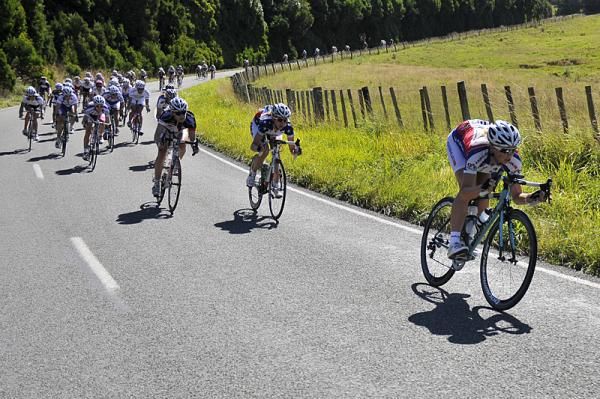 Riders strung out on the descent.