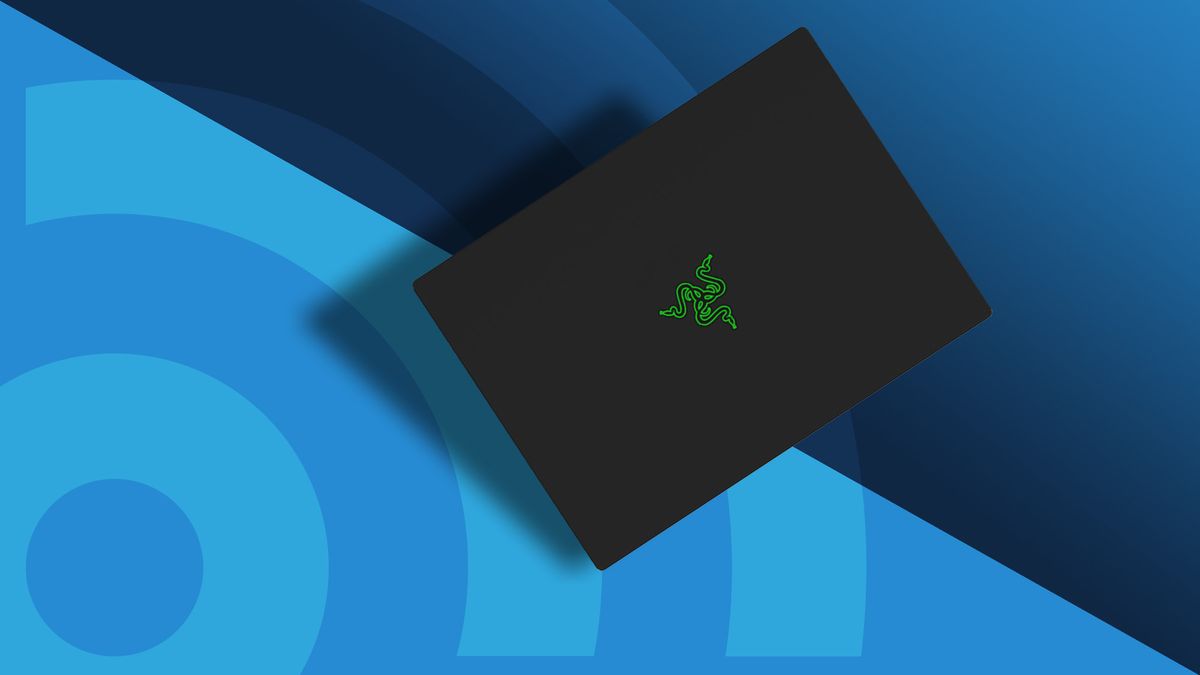 A Razer Blade 14, the best gaming laptop in 2025, against a blue techradar background.