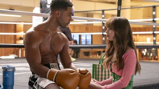 Lucien Laviscount as Alfie, Lily Collins as Emily in Emily in Paris