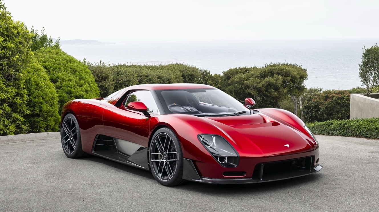 Details of the new McLaren McL6GT, finished in a deep red, looking like a 1970s American racer.