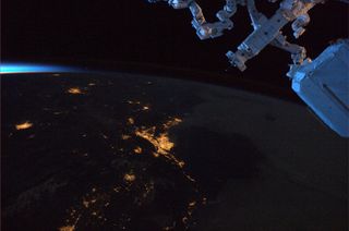 Dawn breaks over California in the United States April 17, 2011 in this photo by NASA astronaut Ron Garan from the International Space Station. The lights of Los Angeles appear in the foreground while San Francisco appears in the back near the horizon.