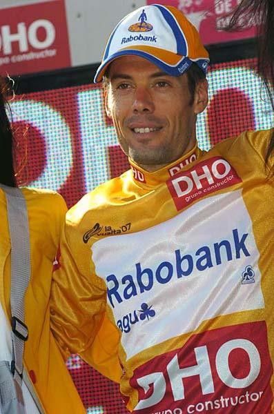 The Spaniard smiles on the podium after a perfect sprint.