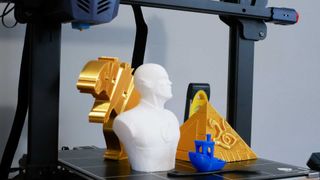 Anycubic Kobra Plus_Test prints posed on 3D printer