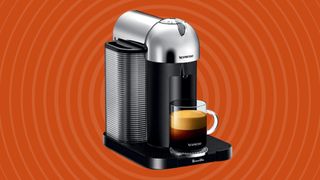 Breville Nespresso coffee machine on orange background